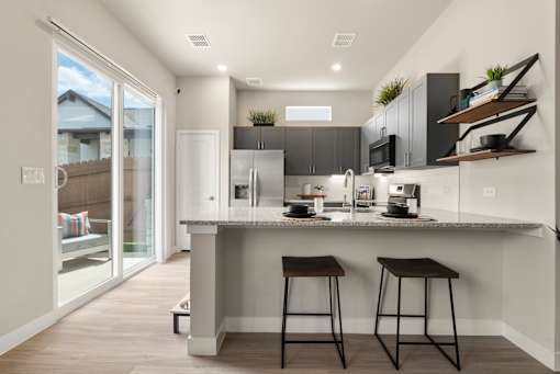 Gourmet Kitchen with Island at Avilla Berry Creek Highlands, Georgetown, TX 78633