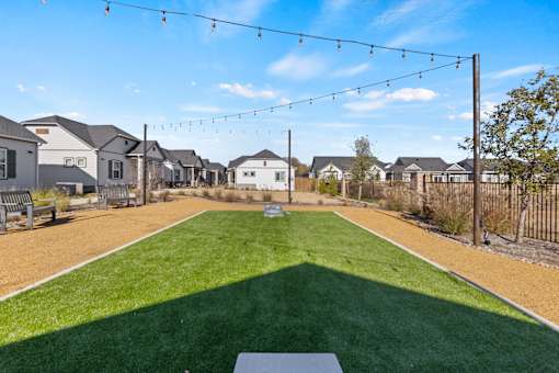 Lawn games and green spaces at Avilla Lakeridge in Arlington, TX 76002.