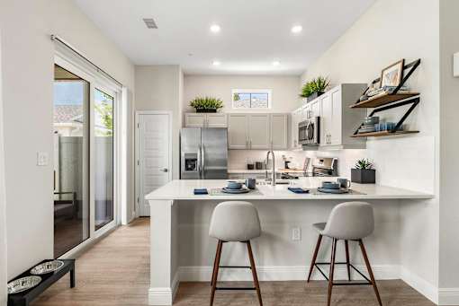 Gourmet Kitchen with Island at Avilla Cypress Creek, Sun City Center, FL 33573