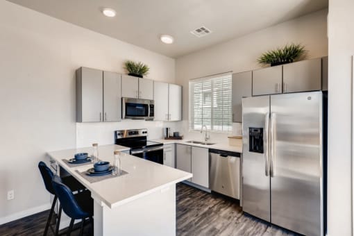 Gourmet Kitchen With Island at Avilla Buffalo Run, Colorado, 80022