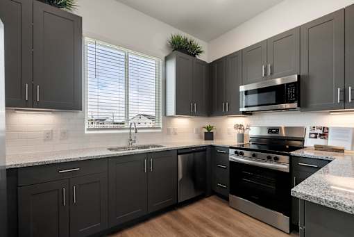Stainless Steel Appliances at Avilla Rio Oaks Apartments, Liberty Hill, TX 78642