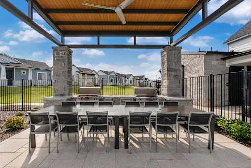Outdoor Grill Area at Avilla Rio Oaks Apartments, Liberty Hill, TX 78642