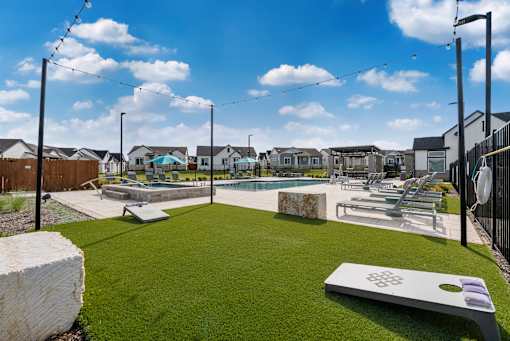 Outdoor Game Area at Avilla Rio Oaks Apartments, Liberty Hill, TX 78642