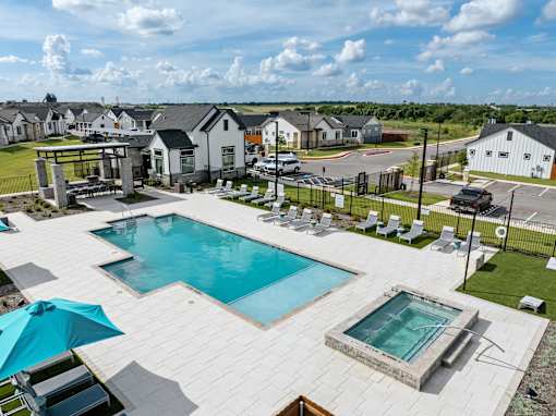 Resort-Style Pool & Hot Tub at Avilla Rio Oaks Apartments, Liberty Hill, TX 78642