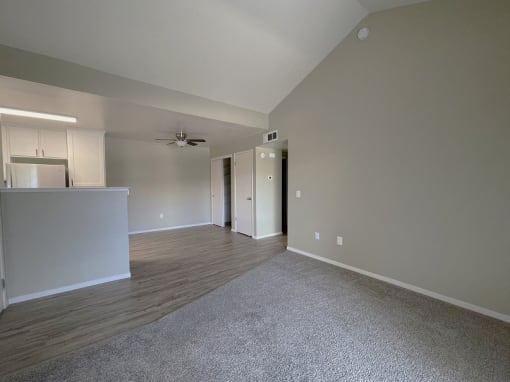 Carpeted Living Area at Sharlands Terrace Apartments, Nevada