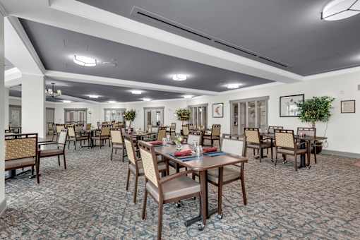 A large room with tables and chairs.