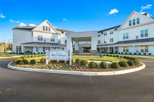 Property exterior at White Springs Senior Living in front of a building at White Springs Senior Living, Virginia 20186