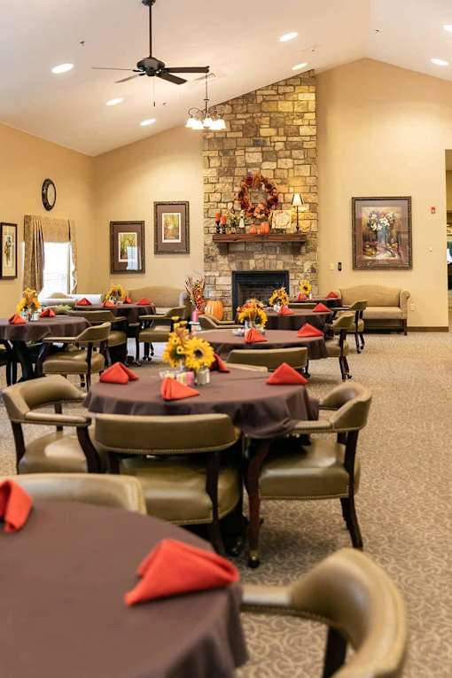 A dining room with tables set for a meal at Hearthside Collierville, Collierville, TN.
