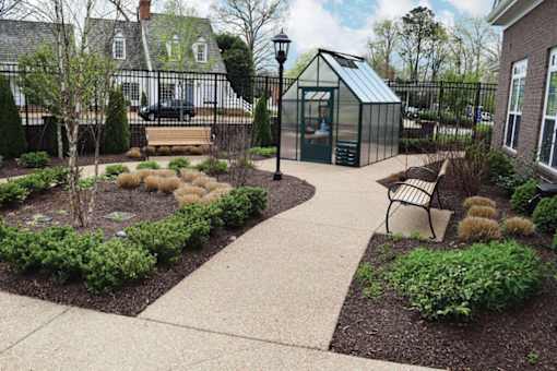 Lush Green Courtyard Wit Walking Paths at Spring Arbor Cottage of Salisbury, Midlothian, Virginia