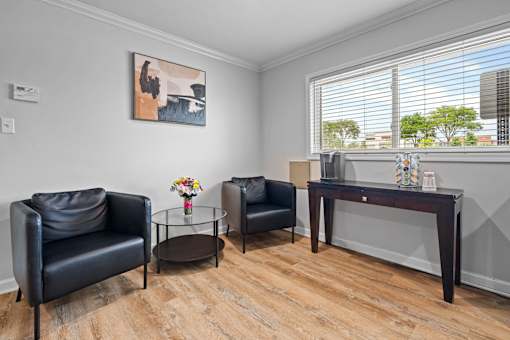 Office waiting area with modern seating and table at Fox Run Apartments, St. Charles, IL 60174