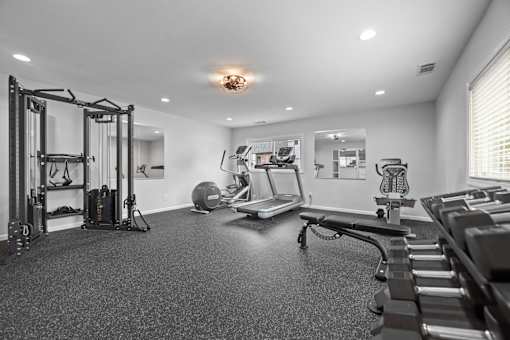 Home gym with cardio and weight training equipment at Fox Run Apartments, Illinois, 60174