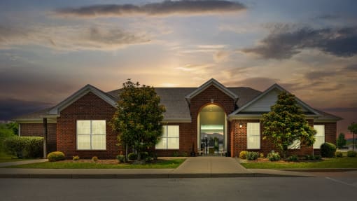 Exterior view of the clubhouse leasing office at sunset at The Reserves of Thomas Glen, Shepherdsville, KY, 40165