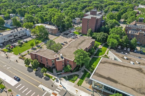 an aerial view of the courthouse and neighboring buildings in the city