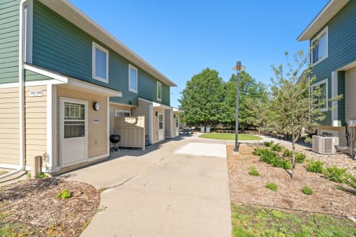 the preserve at ballantyne commons walkway between apartment buildings