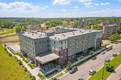 an aerial view of an apartment building in the city
