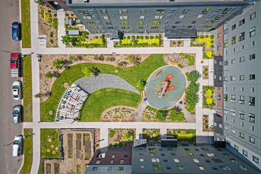 a rendering of a park with a fountain in the middle