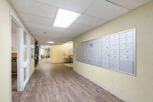 a long hallway with a calendar on the wall