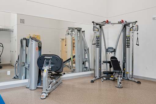 the gym at the flats at big tex apartments