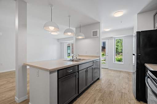 a kitchen with a counter top and a sink