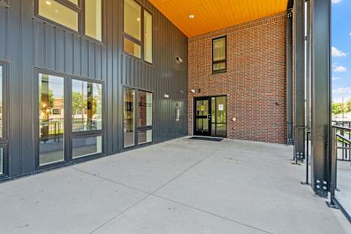 the preserve at ballantyne commons exterior walkway with glass doors