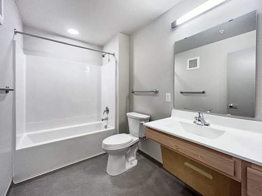 the preserve at ballantyne commons bathroom with sink toilet and shower