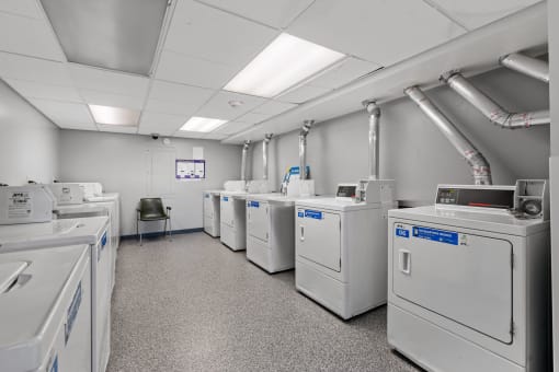 a room filled with washers and dryers