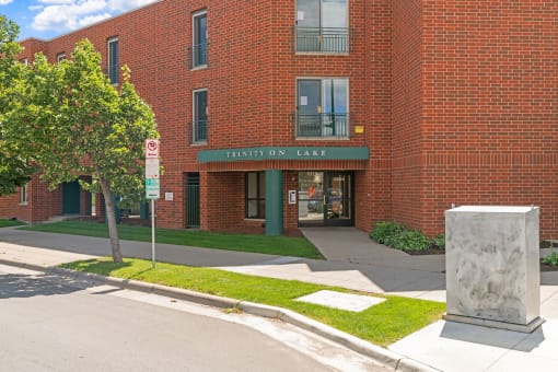 a brick building with a sign that reads