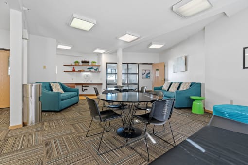 Party room with a round table and chairs