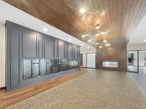 a large room with a wall of vending machines in it