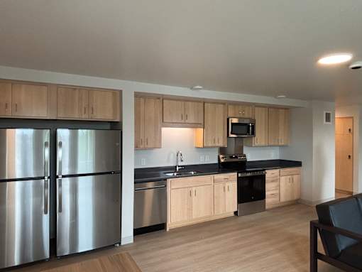Kitchen area in 6 Person Suite