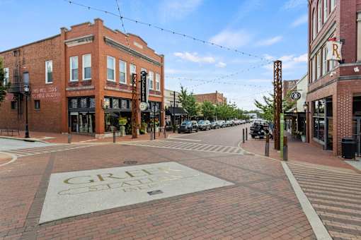 A city square with a sign that says "Great American State".