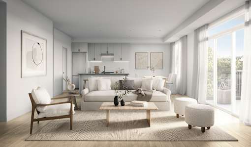 a white living room with a couch and a table