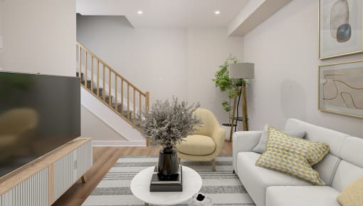 a living room with a white couch and a coffee table