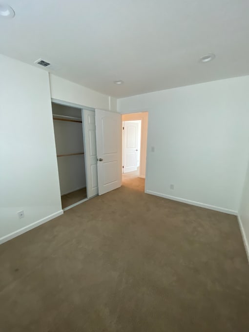 A white staircase with a light on top.