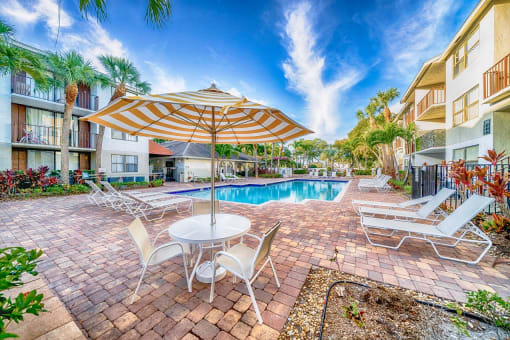 Pool With Sundecks at Bella Lago Vista, West Palm Beach