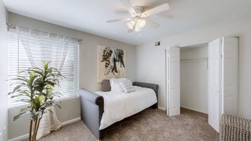 a bedroom with a bed and a ceiling fan at Halsey Flats, Kentucky
