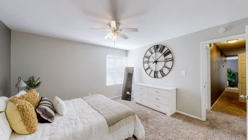 Bedroom with cozy bed at Halsey Flats, Louisville, KY