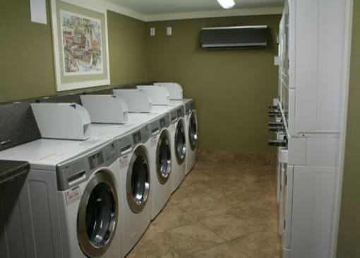 a washer and dryer are in a laundry room