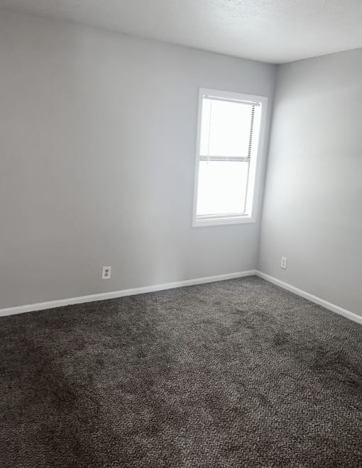 an empty room with a window