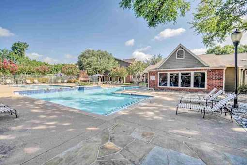 our apartments have a resort style pool with lounge chairs