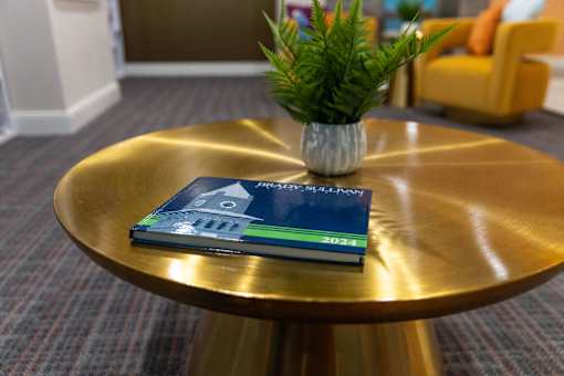 a book sitting on a table in a lobby