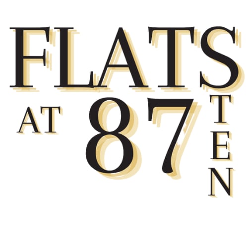 A graphic with the text "FLATS AT 87 TEN" in gold and black.