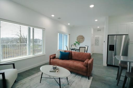 a living room with a couch and a table