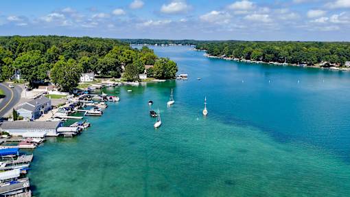 arial view of boats in the water on a lake
