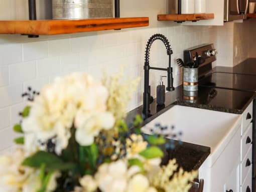 a kitchen with a sink and a counter top