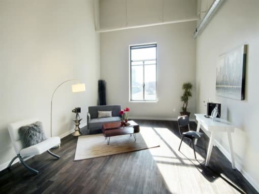 a living room with a couch and a table