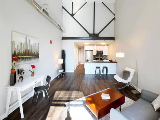 a living room with a couch and a table