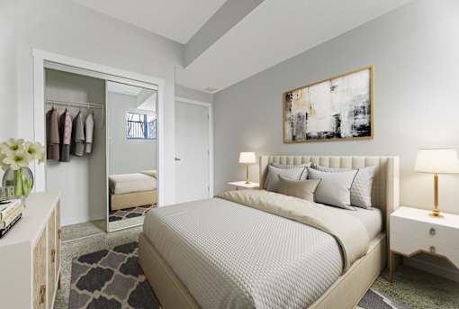 A bedroom with a large bed and a painting on the wall.