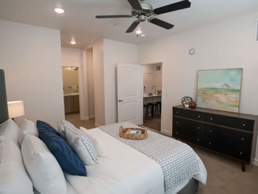 Gorgeous Primary Bedroom with Ceiling Fan at Foothill Lofts Apartments & Townhomes, Logan