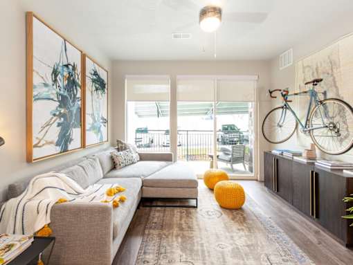 Spacious living room with natural lighting at Soleil Lofts